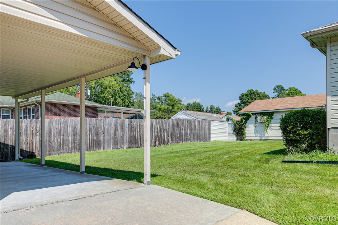 3307 Walnut Street Hopewell, VA 23860 - Photo 6 of 38 a view of a backyard with a garden and swing