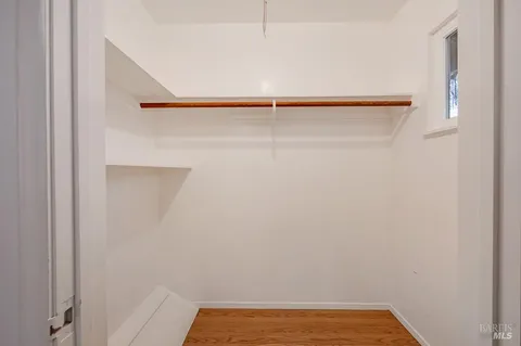 a view of a room with racks on the wall