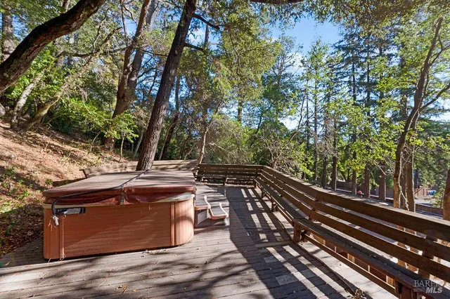 a view of a backyard with sitting area