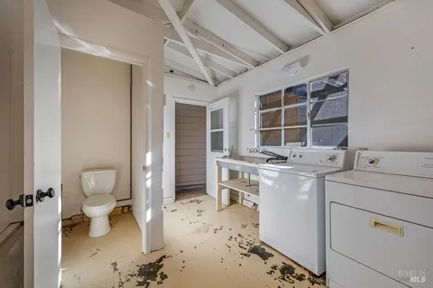 a view of a house with a tree