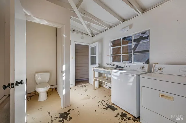 a view of a house with a tree