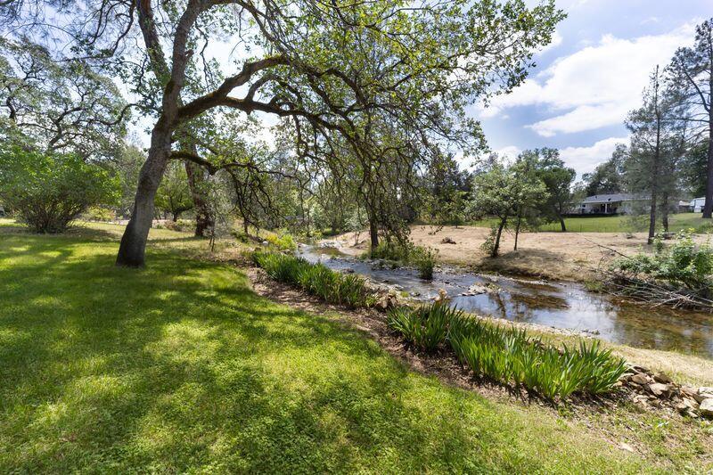 19860 Union School Road Redding, CA 96003 - Photo 24 of 32 yard and creek