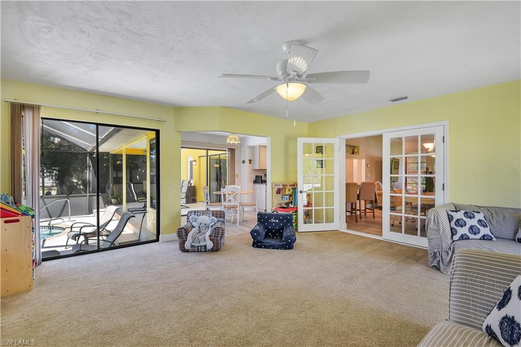 8444 Lemon Road Fort Myers, FL 33967 - Photo 13 of 30 a lobby with furniture and large windows