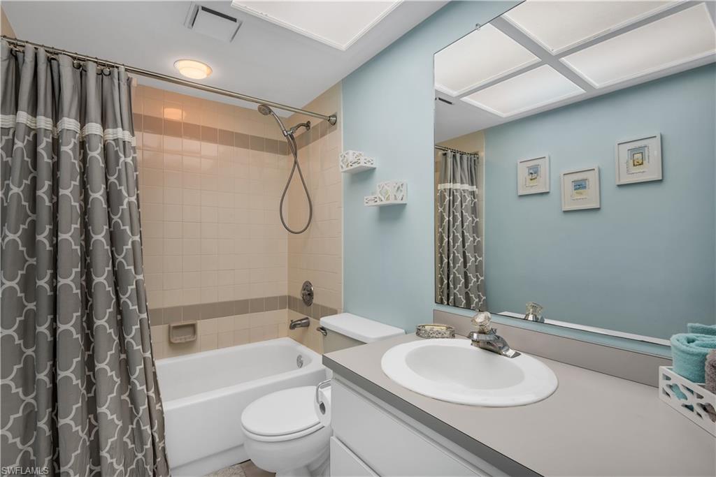 8444 Lemon Road Fort Myers, FL 33967 - Photo 23 of 30 a bathroom with a sink a toilet and shower