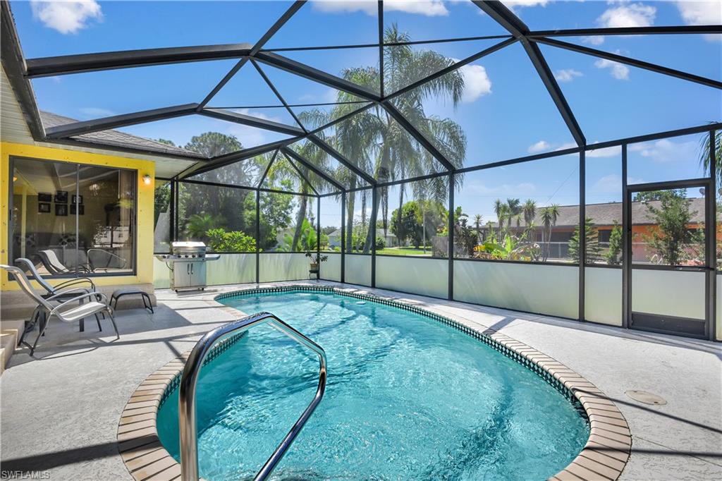 8444 Lemon Road Fort Myers, FL 33967 - Photo 5 of 30 a view of a swimming pool with a patio