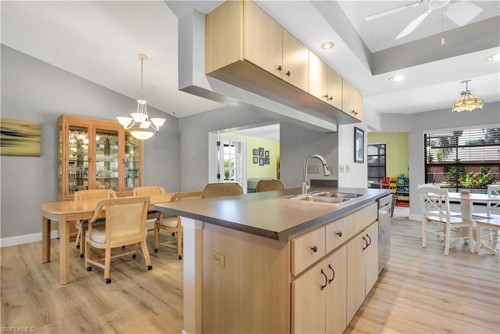 8444 Lemon Road Fort Myers, FL 33967 - Photo 10 of 30 a kitchen with a dining table and chairs