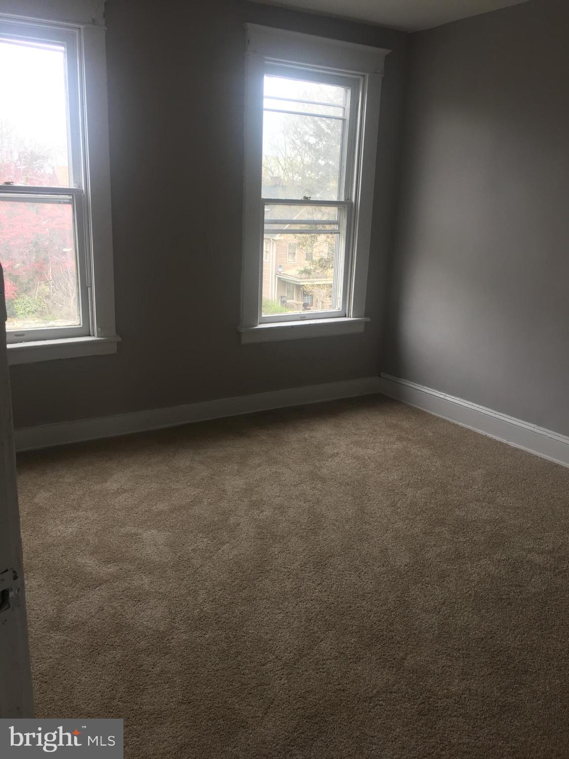 713 Springfield Avenue Baltimore, MD 21212 - Photo 16 of 28 an empty room with a window