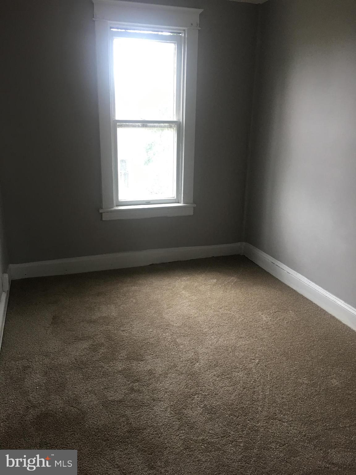 713 Springfield Avenue Baltimore, MD 21212 - Photo 18 of 28 an empty room with a window