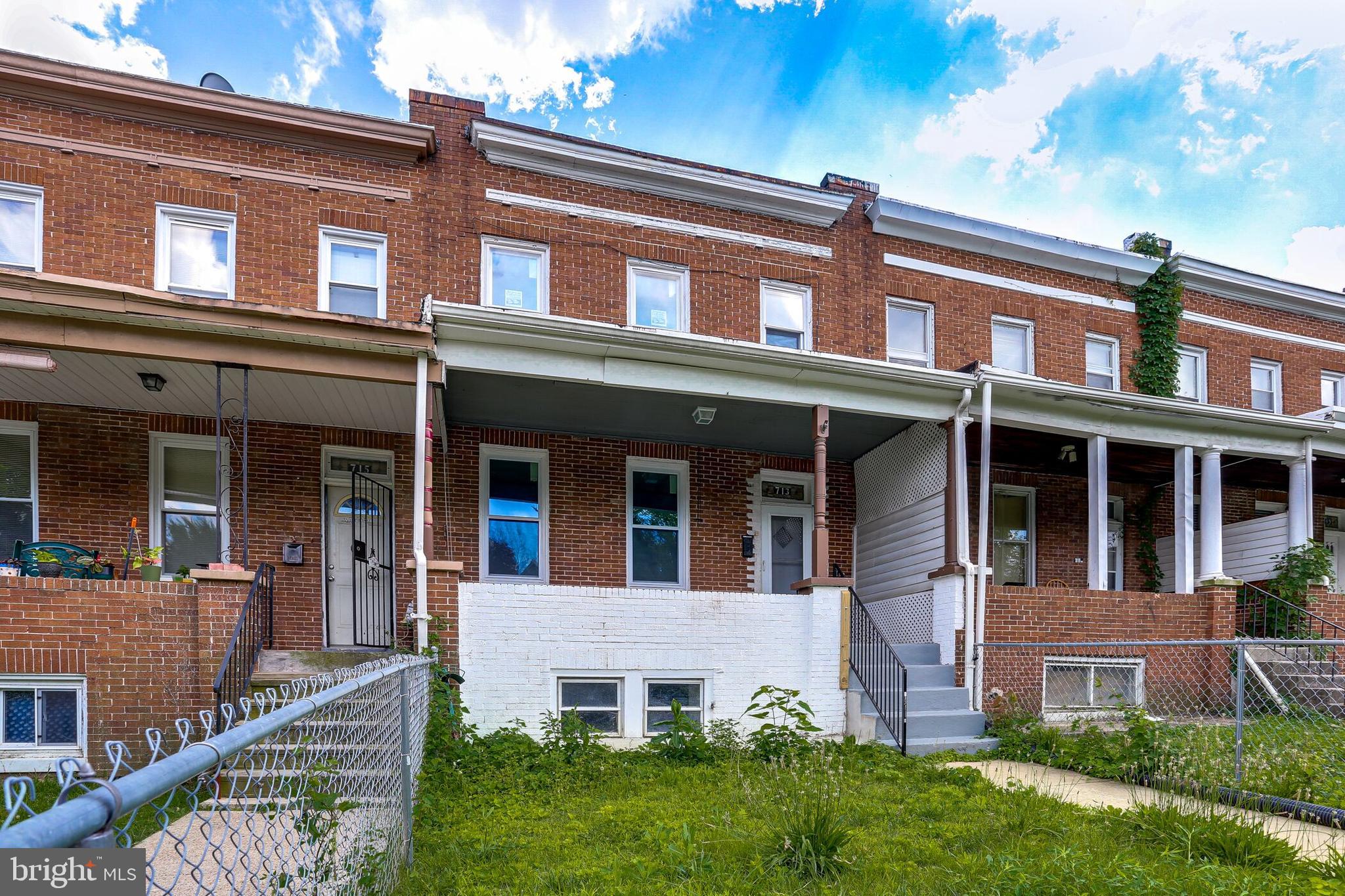 713 Springfield Avenue Baltimore, MD 21212 - Photo 2 of 28 front view of a brick building