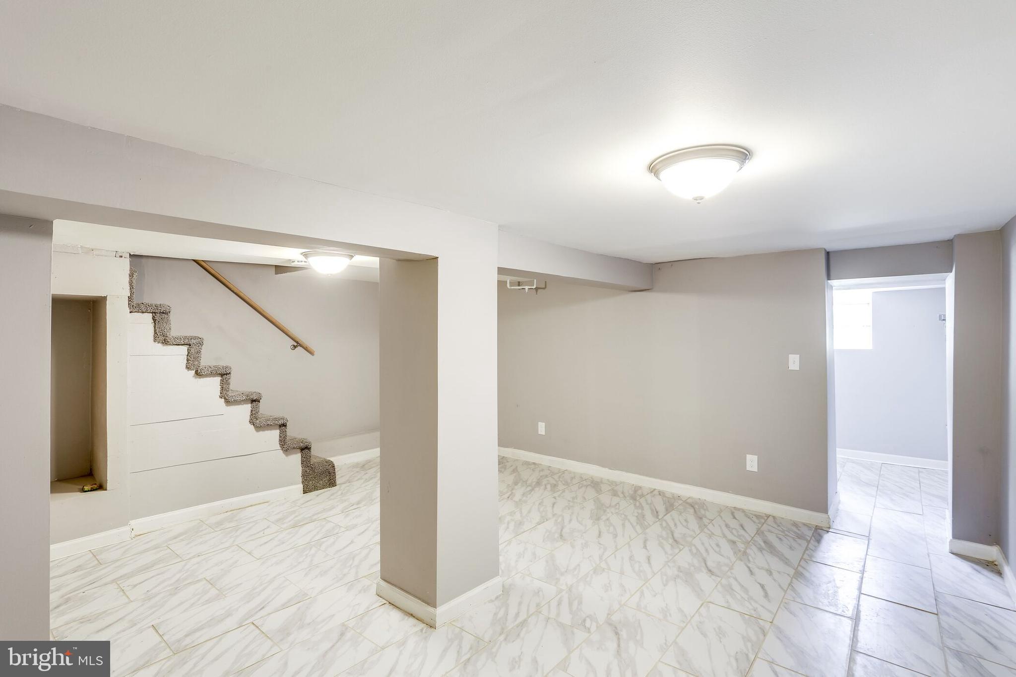 713 Springfield Avenue Baltimore, MD 21212 - Photo 21 of 28 a view of entryway and hall with wooden floor
