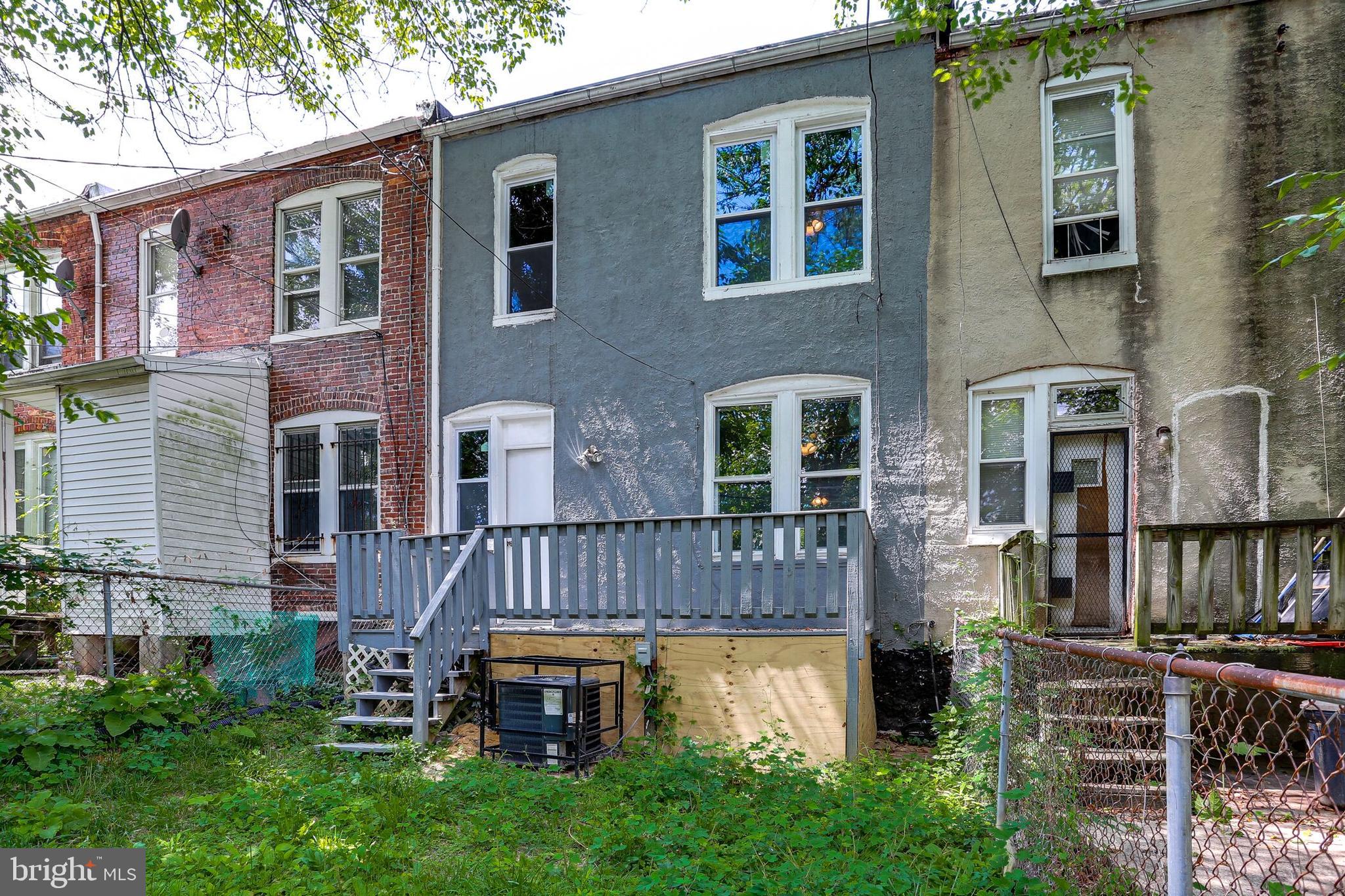 713 Springfield Avenue Baltimore, MD 21212 - Photo 26 of 28 a swimming pool with outdoor seating and yard