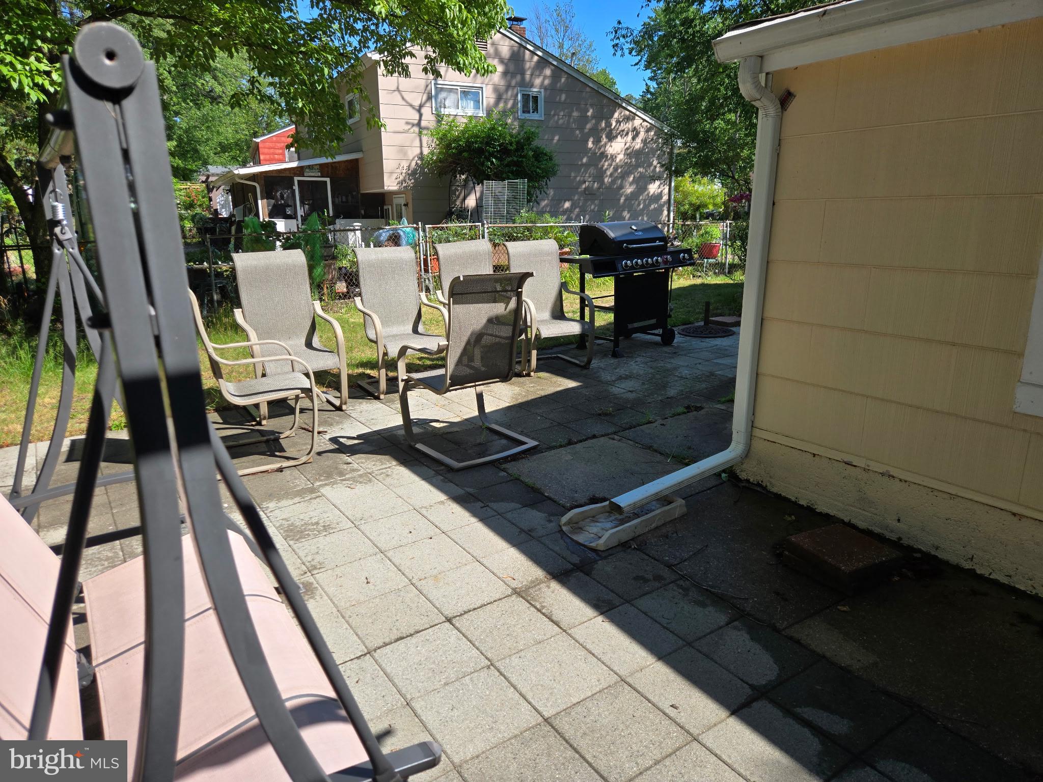909 Bentley Road Lindenwold, NJ 08021 - Photo 14 of 15 Sunny patio with seating and grill.