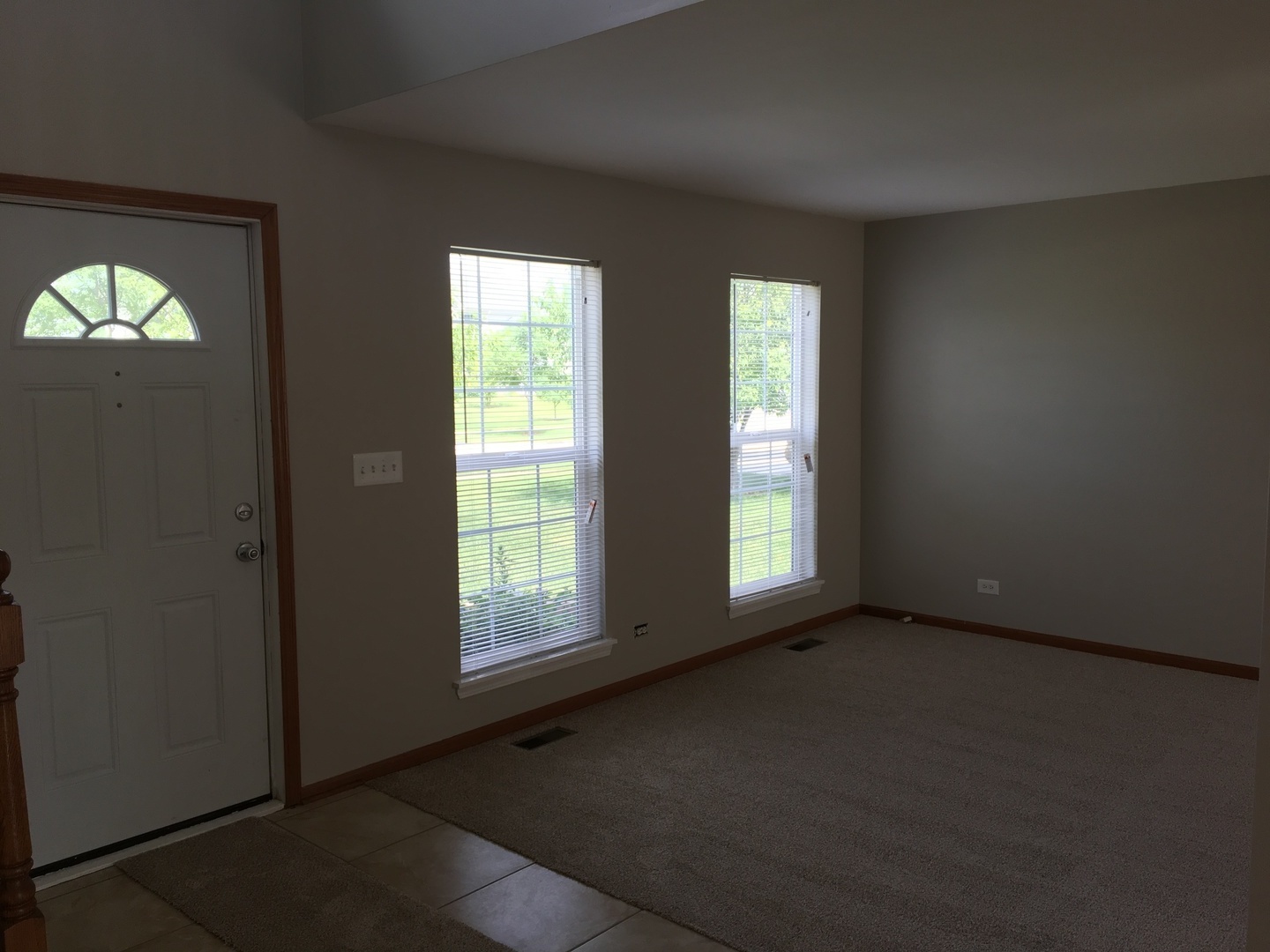 Undisclosed Address Round Lake, IL 60073 - Photo 2 of 29 an empty room with windows