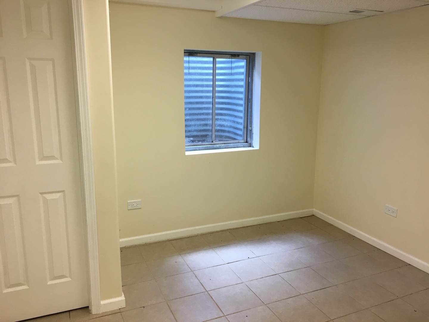 Undisclosed Address Round Lake, IL 60073 - Photo 25 of 29 a view of an empty room with a window