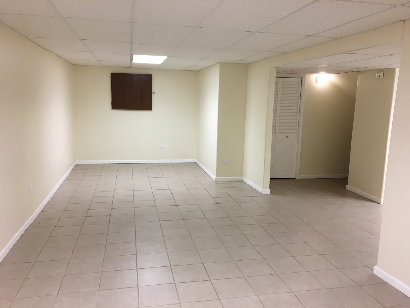 Undisclosed Address Round Lake, IL 60073 - Photo 26 of 29 an empty room with projector and stainless steel appliances