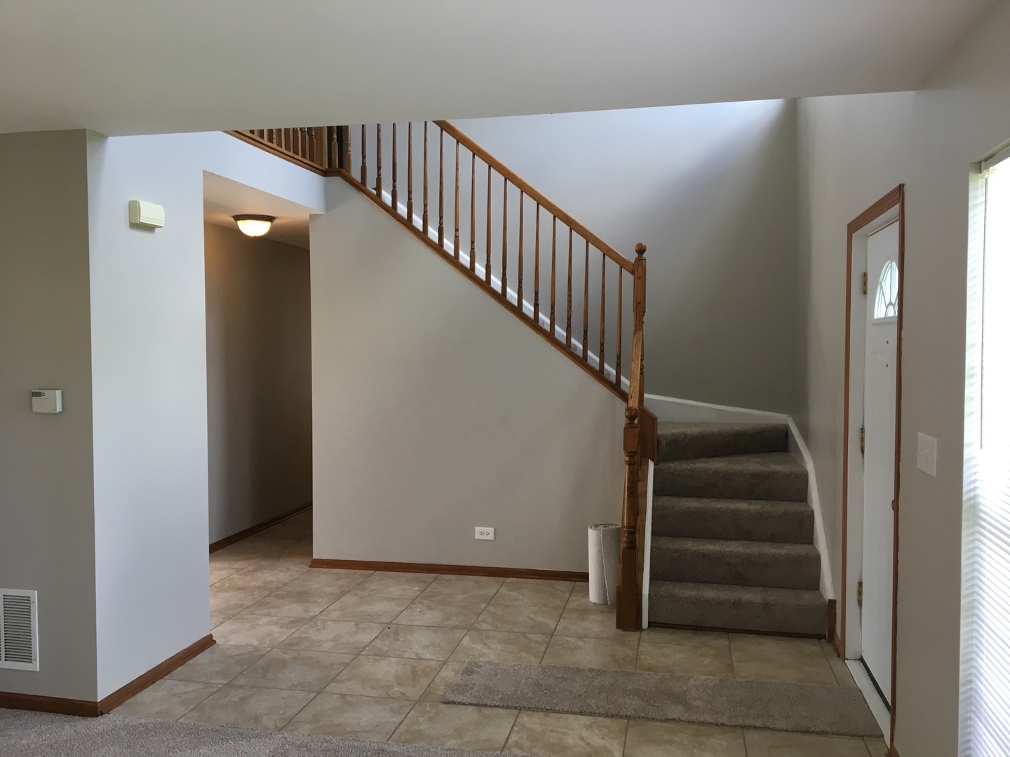 Undisclosed Address Round Lake, IL 60073 - Photo 5 of 29 a view of entryway and hall