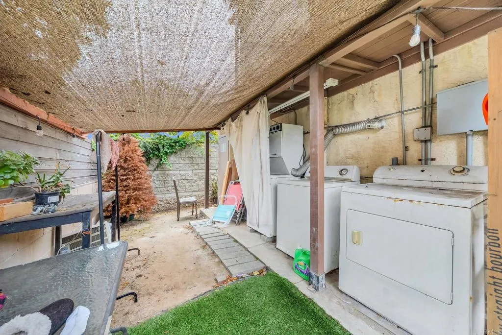 3018 Nimitz Boulevard San Diego, CA 92106 - Photo 7 of 18 a backyard of a house with outdoor seating