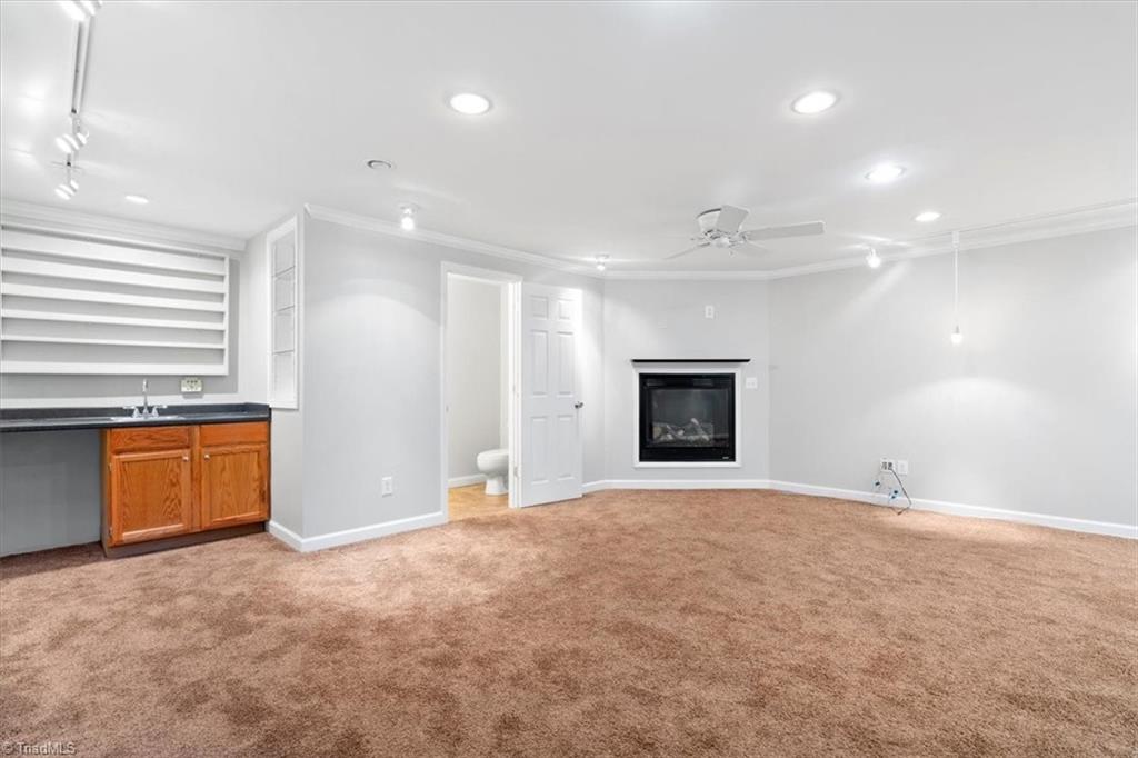520 Brummel Lane High Point, NC 27265 - Photo 26 of 39 Den with gas log fireplace