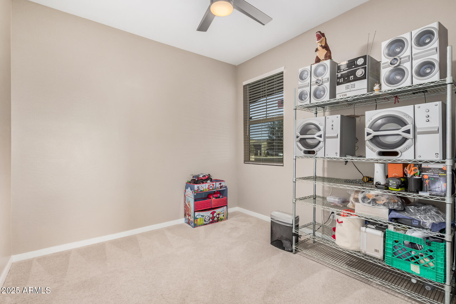 10736 West Chipman Road Tolleson, AZ 85353 - Photo 20 of 27 a room with storage and utility