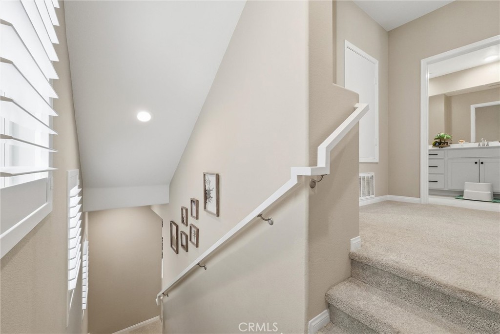 155 Spectacle Irvine, CA 92618 - Photo 14 of 40 a view of entryway and hall with wooden floor