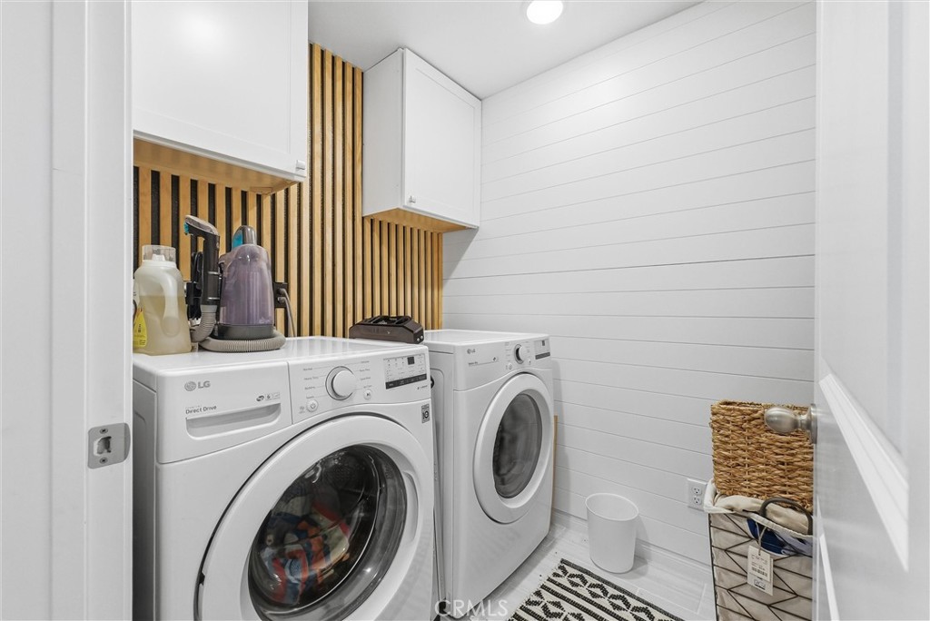 155 Spectacle Irvine, CA 92618 - Photo 20 of 40 a view of a bedroom with washer and dryer