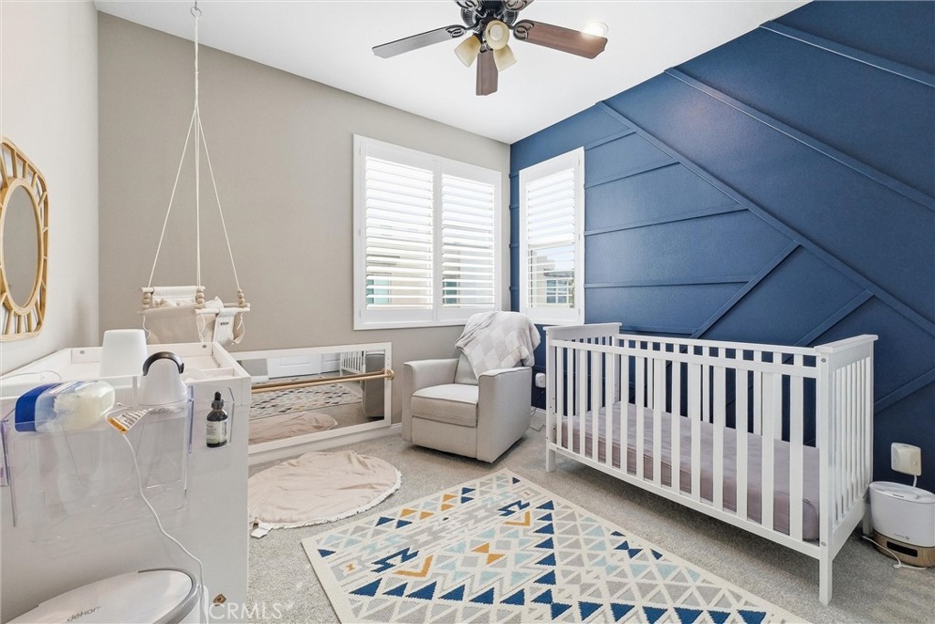 155 Spectacle Irvine, CA 92618 - Photo 21 of 40 a bedroom with furniture and windows