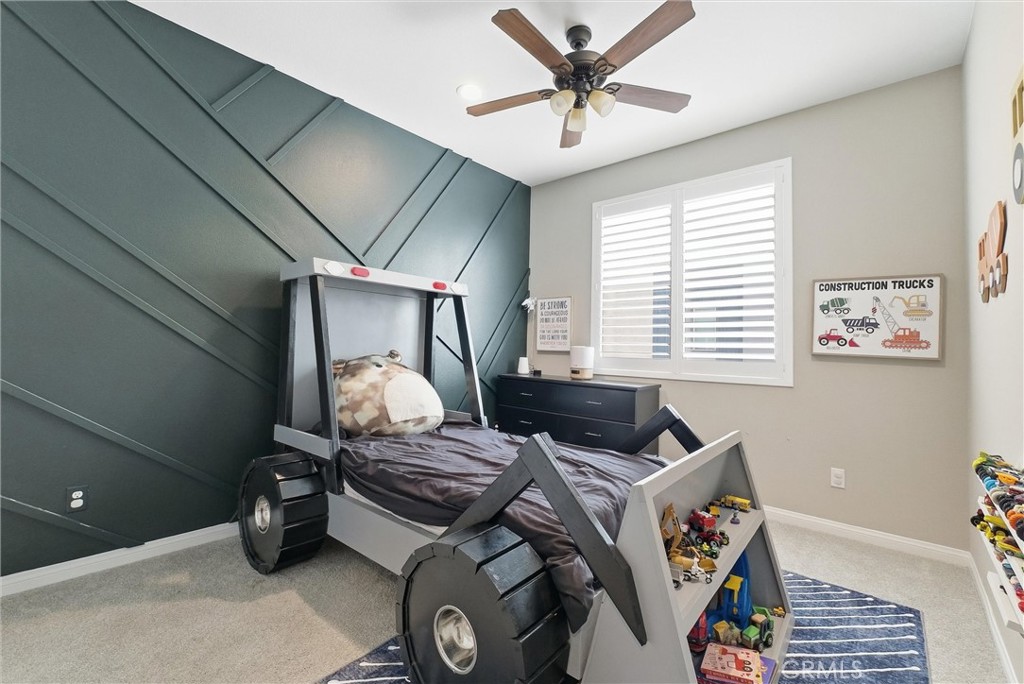 155 Spectacle Irvine, CA 92618 - Photo 23 of 40 a bedroom with furniture and a window