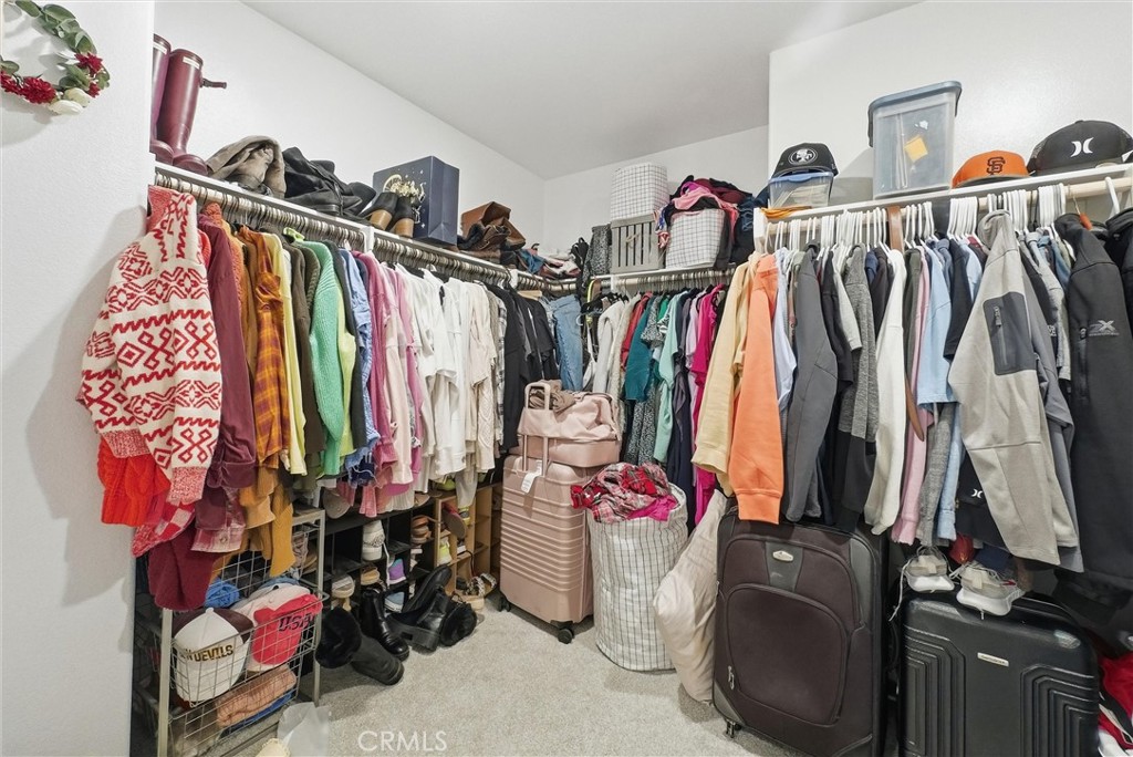 155 Spectacle Irvine, CA 92618 - Photo 30 of 40 a view of walk in closet with clothes