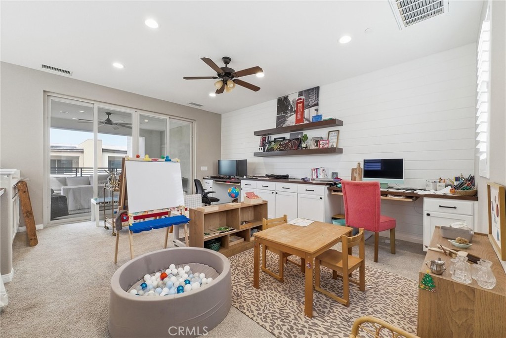 155 Spectacle Irvine, CA 92618 - Photo 31 of 40 a living room with furniture and view of kitchen