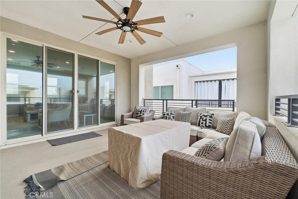 155 Spectacle Irvine, CA 92618 - Photo 35 of 40 a living room with furniture and a large window