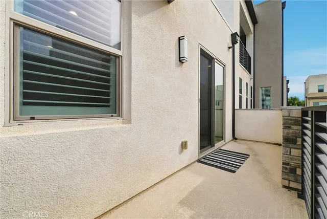 a view of a balcony and chair