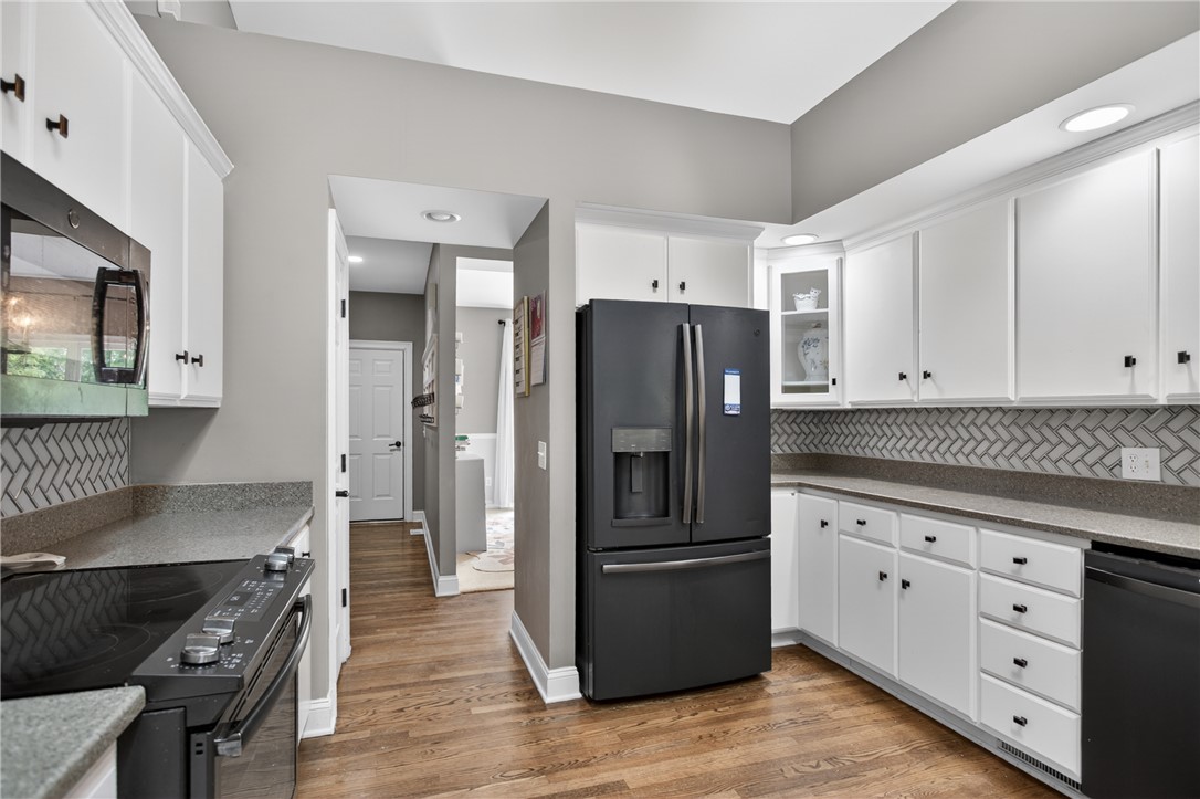 136 Loran Pointe Circle Seneca, SC 29672 - Photo 10 of 50 A well-lit kitchen with sleek appliances and ample counter space.