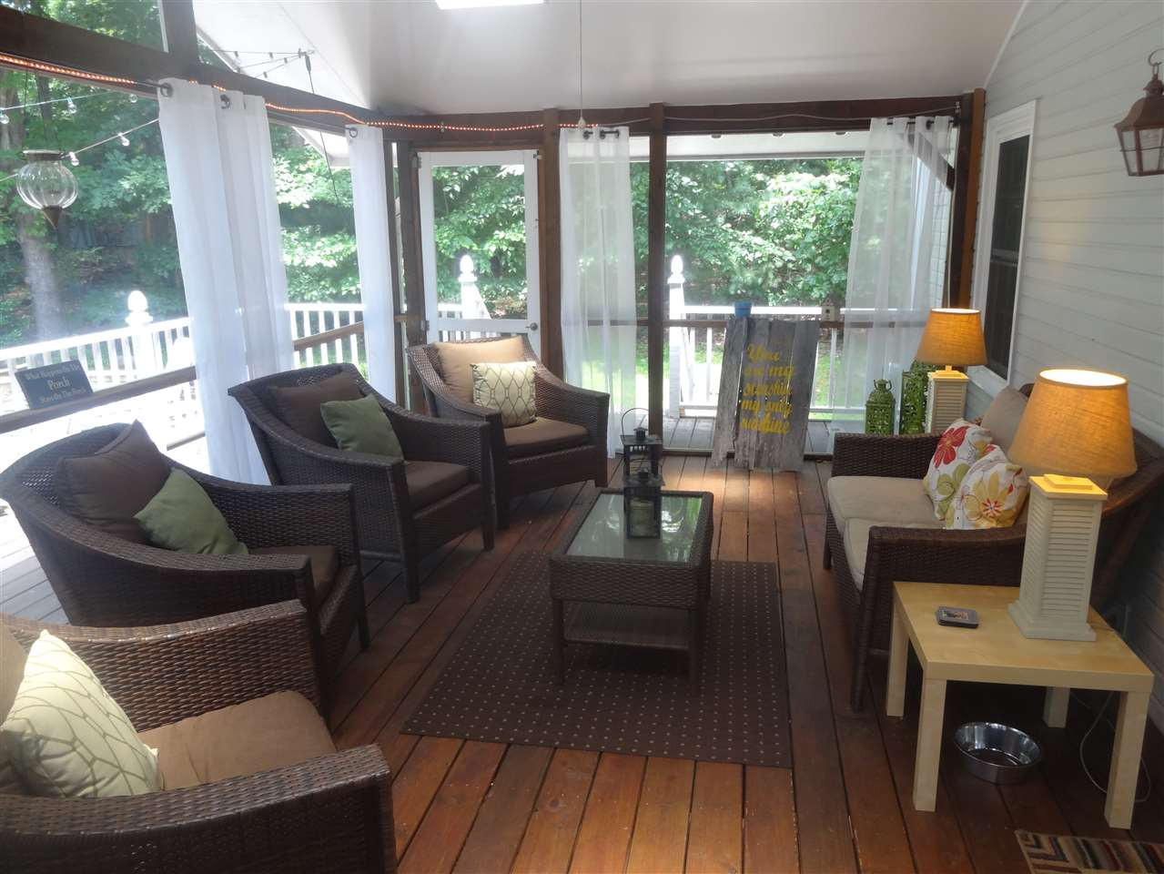 Breezy screened in porch overlooking new patio w/ fireplace Screened in Porch