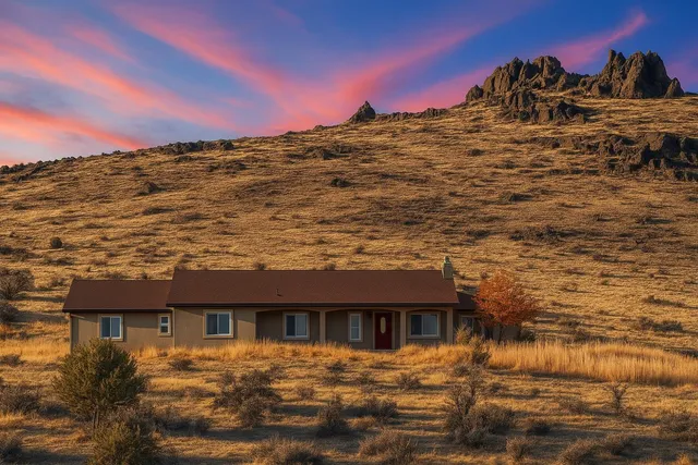 a view of houses with ocean view