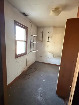 an empty room with windows