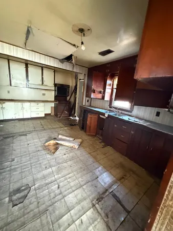 a room with furniture and a fireplace