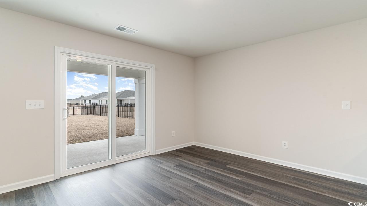 6047 Fuller Rdg Court Conway, SC 29526 - Photo 11 of 26 Unfurnished room with dark wood-type flooring