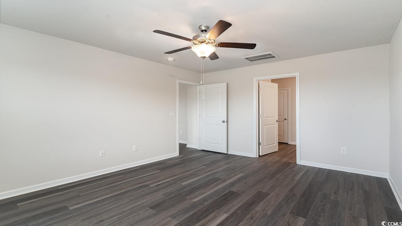 6047 Fuller Rdg Court Conway, SC 29526 - Photo 13 of 26 Unfurnished bedroom with ceiling fan and dark hard