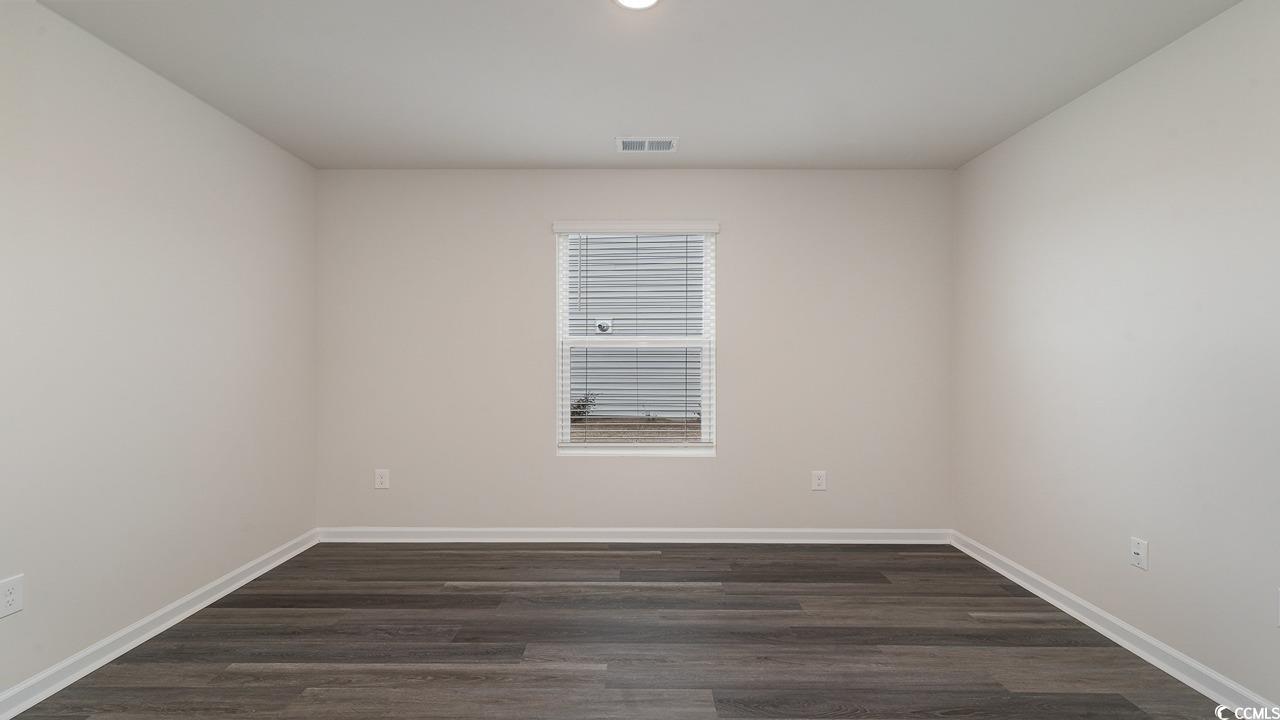 6047 Fuller Rdg Court Conway, SC 29526 - Photo 20 of 26 Empty room with dark wood-type flooring