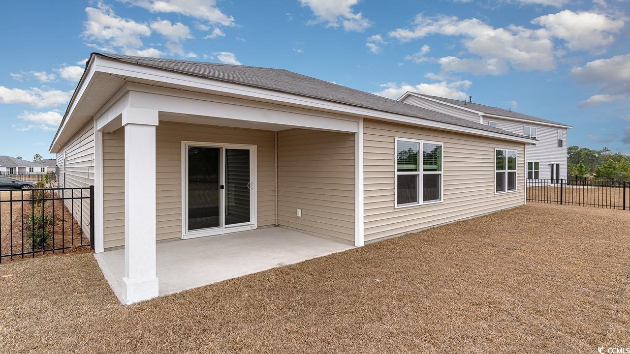6047 Fuller Rdg Court Conway, SC 29526 - Photo 24 of 26 Back of house featuring a patio area