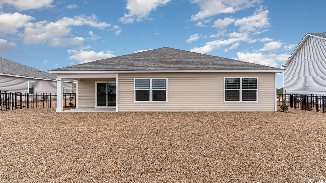 6047 Fuller Rdg Court Conway, SC 29526 - Photo 25 of 26 Back of house with a patio
