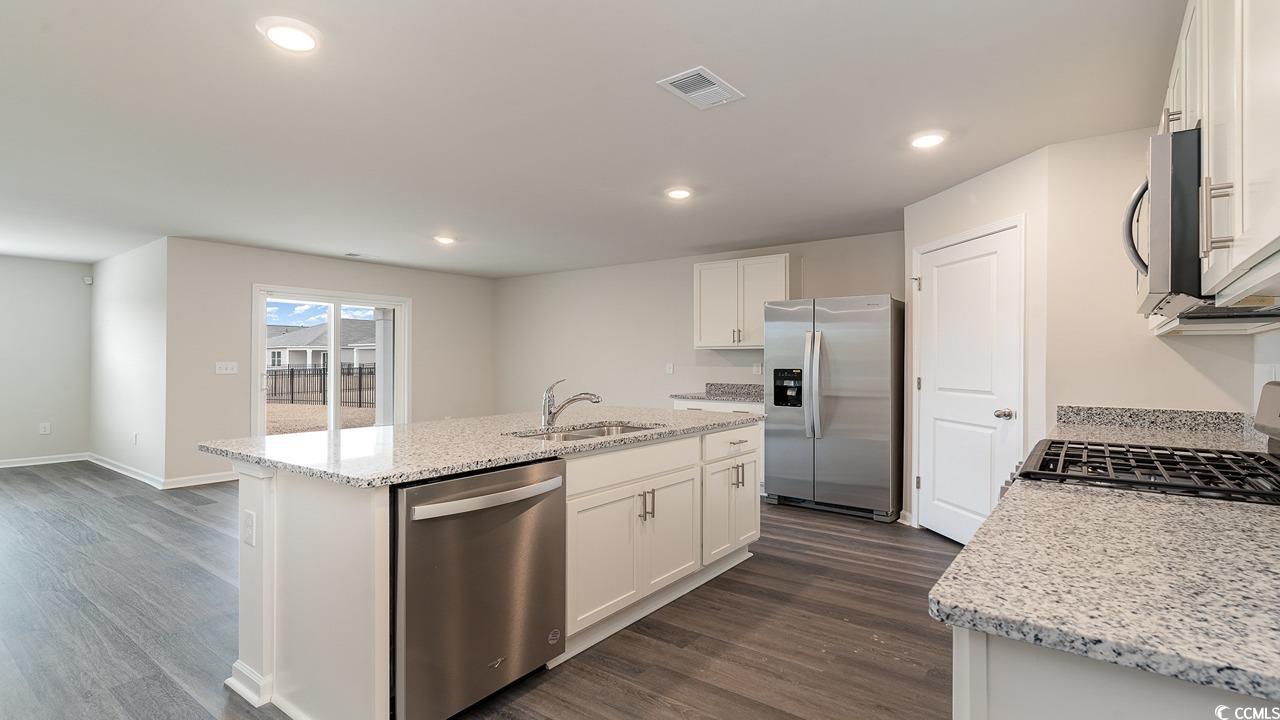 6047 Fuller Rdg Court Conway, SC 29526 - Photo 10 of 26 Kitchen with white cabinetry, stainless steel appl