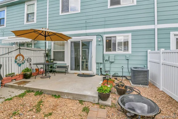 a backyard of a house with seating space