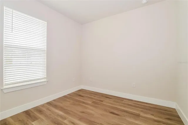 a view of a room that has a window in it