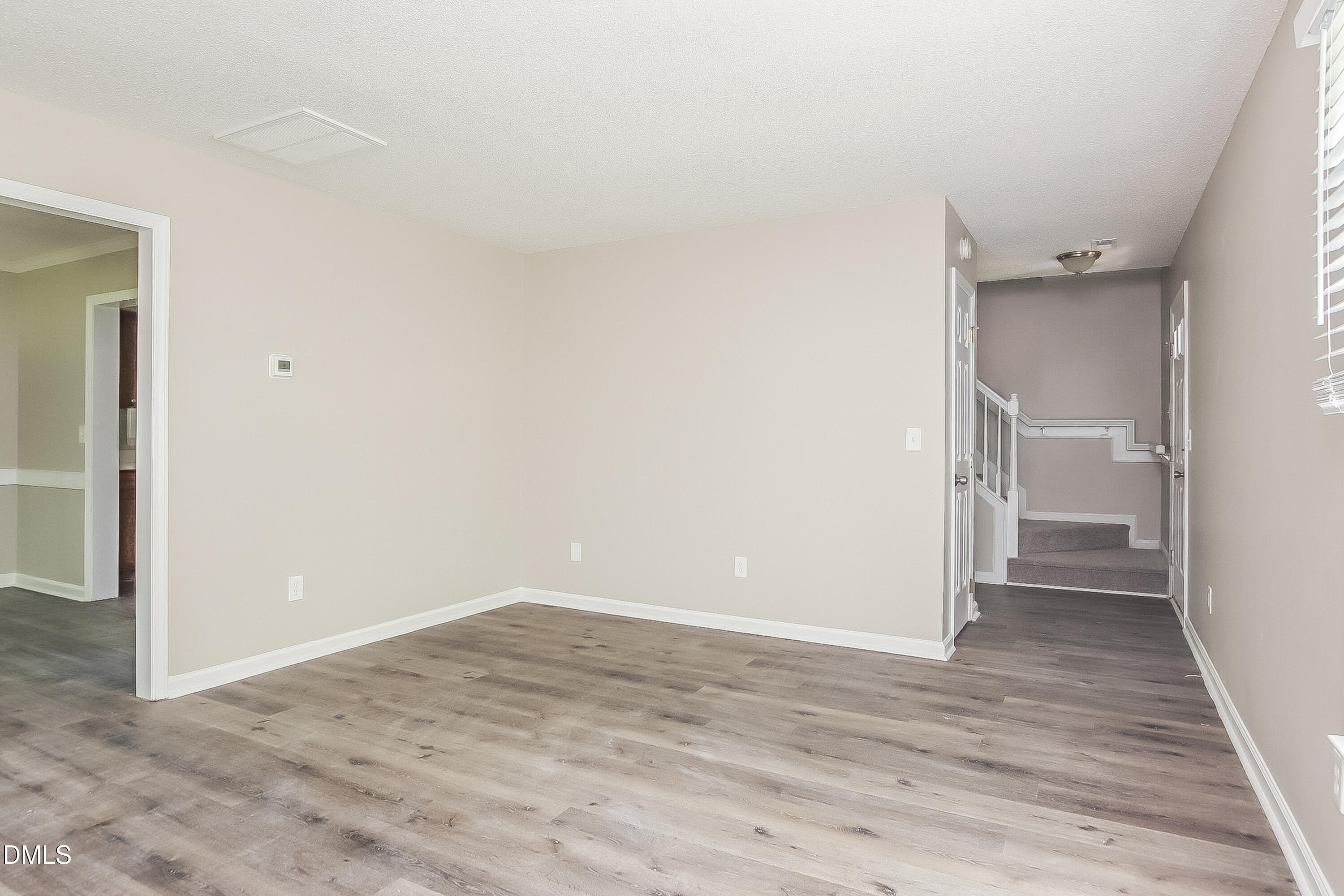 3345 Daingerfield Drive Raleigh, NC 27616 - Photo 3 of 17 004-photo-living-room-8284265