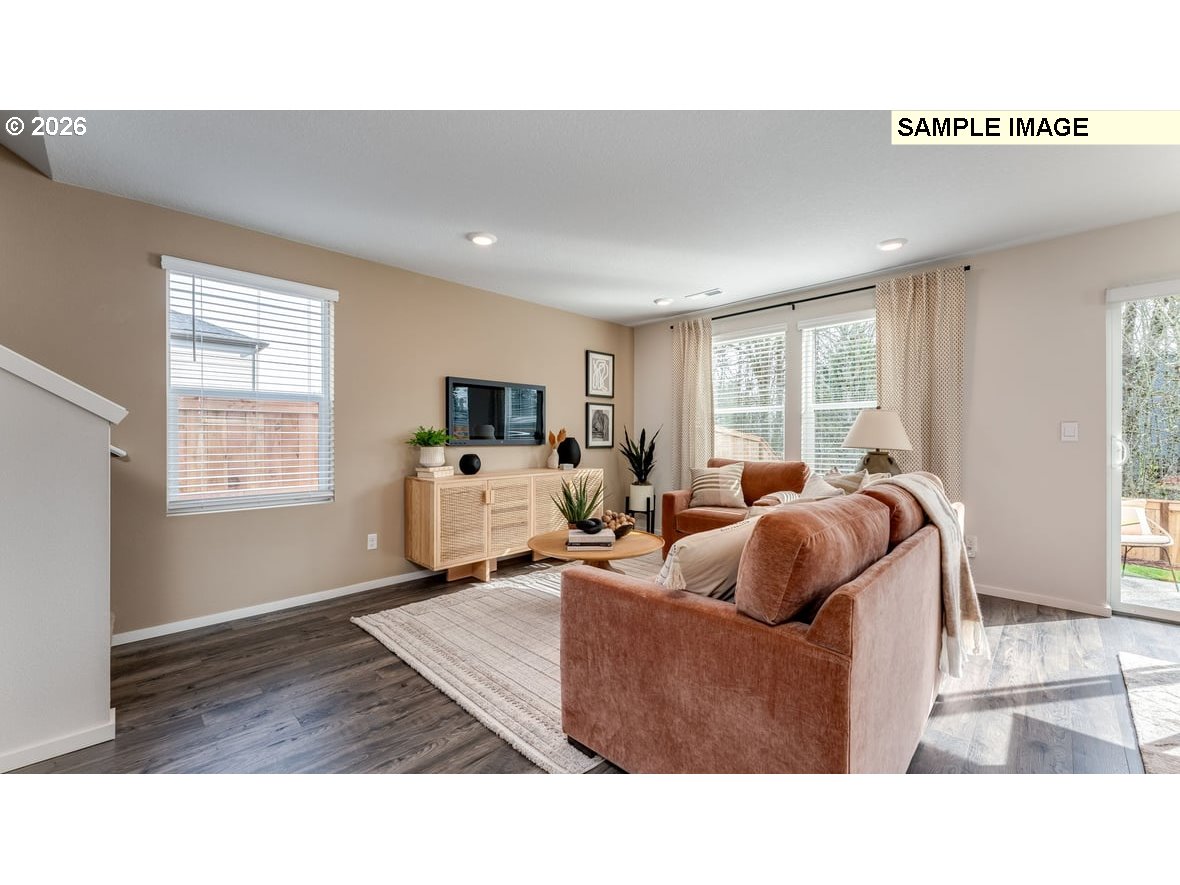 126 Coho Loop Woodland, WA 98674 - Photo 11 of 27 a living room with furniture window and flat screen tv