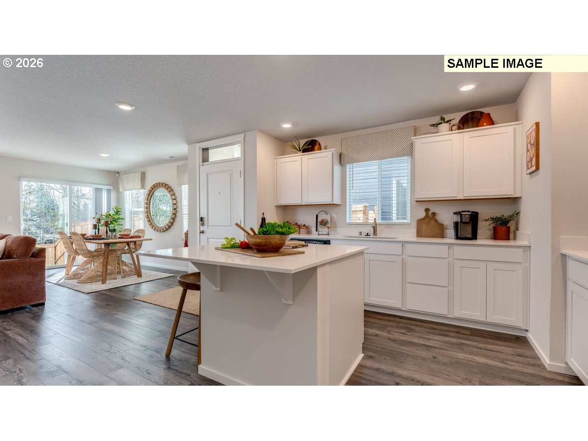 126 Coho Loop Woodland, WA 98674 - Photo 4 of 27 a kitchen with sink and cabinets