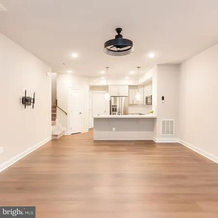 a view of a kitchen with an empty space