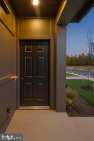 a view of porch with a door and a yard