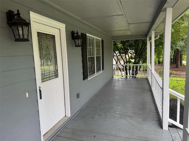 a view of a porch with chairs